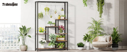 DecorBites™ 5-tier tall black metal and wood plant stand with multiple shelves and hanging hooks displaying potted plants
