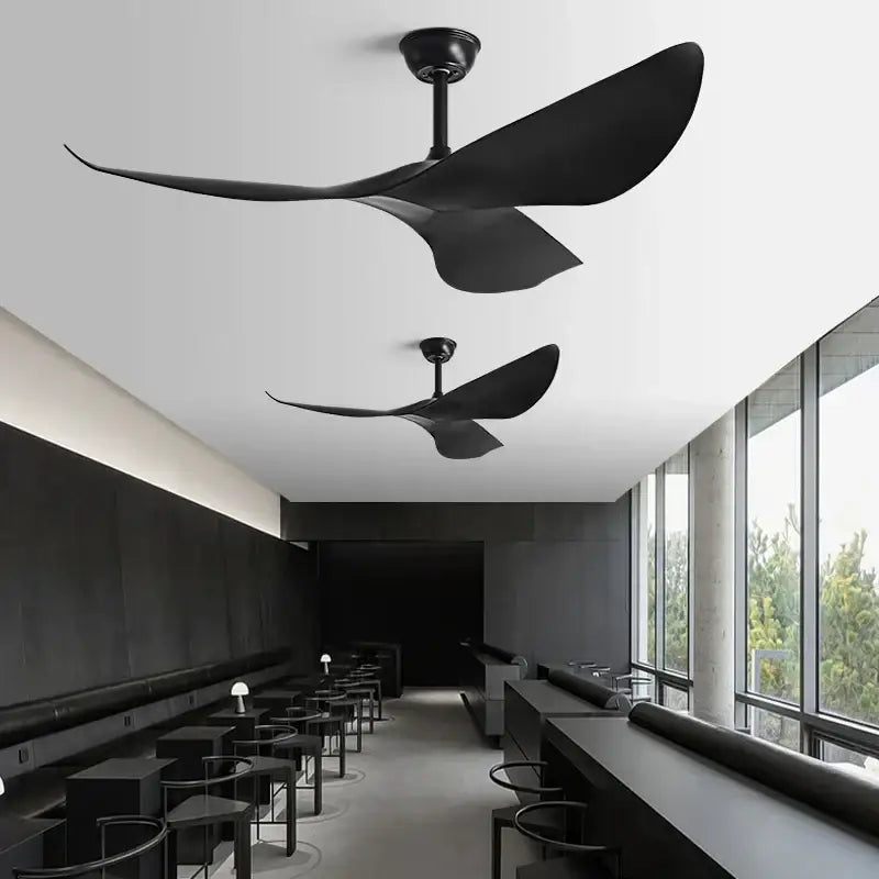 Modern bronze and black ceiling fan with sleek wing-like blades and remote control for living room use