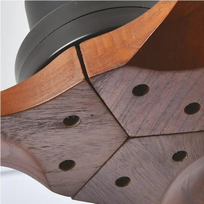 Modern wood propeller ceiling fan with warm natural wood grain blades and silent silver hub for living room use