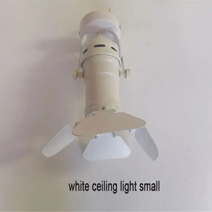 White decorbites™ cob led track light with adjustable arms and frosted lens for clothing store spotlight use