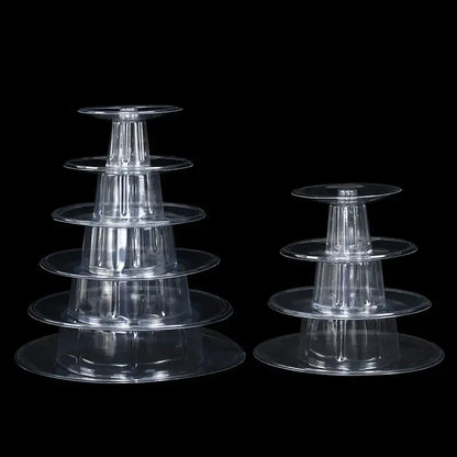 Clear plastic tier macaron tower stand with four circular levels and central column for cake display by DecorBites