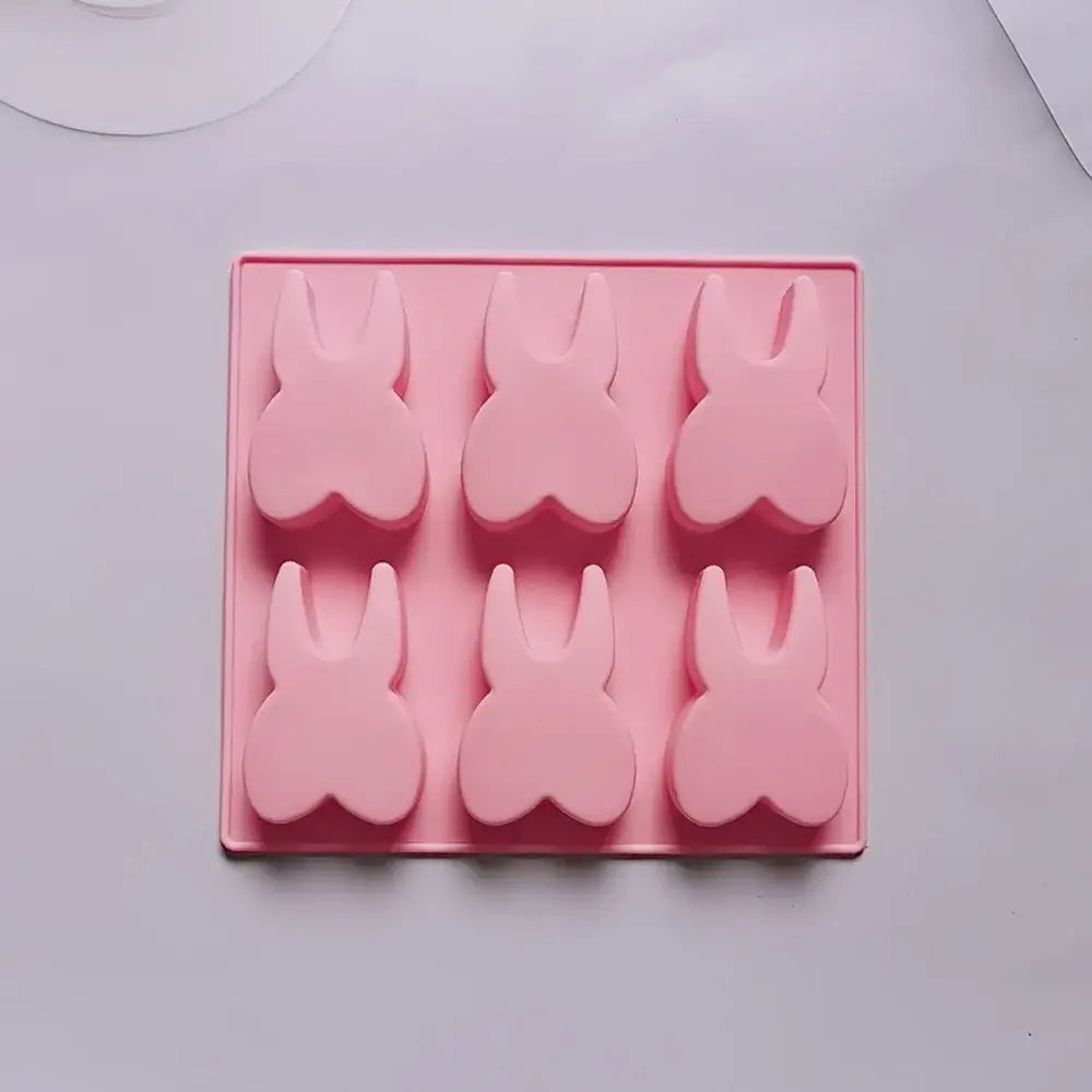 Pink silicone mold bunny shaped with six cavities for ice cubes candy and cake bakeware decorbites™ hole tooth silicone