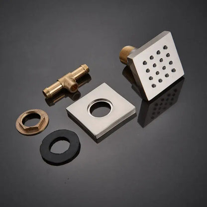Square stainless steel shower head with a grid of small nozzles for shower massage jets in DecorBites™ 6-piece set