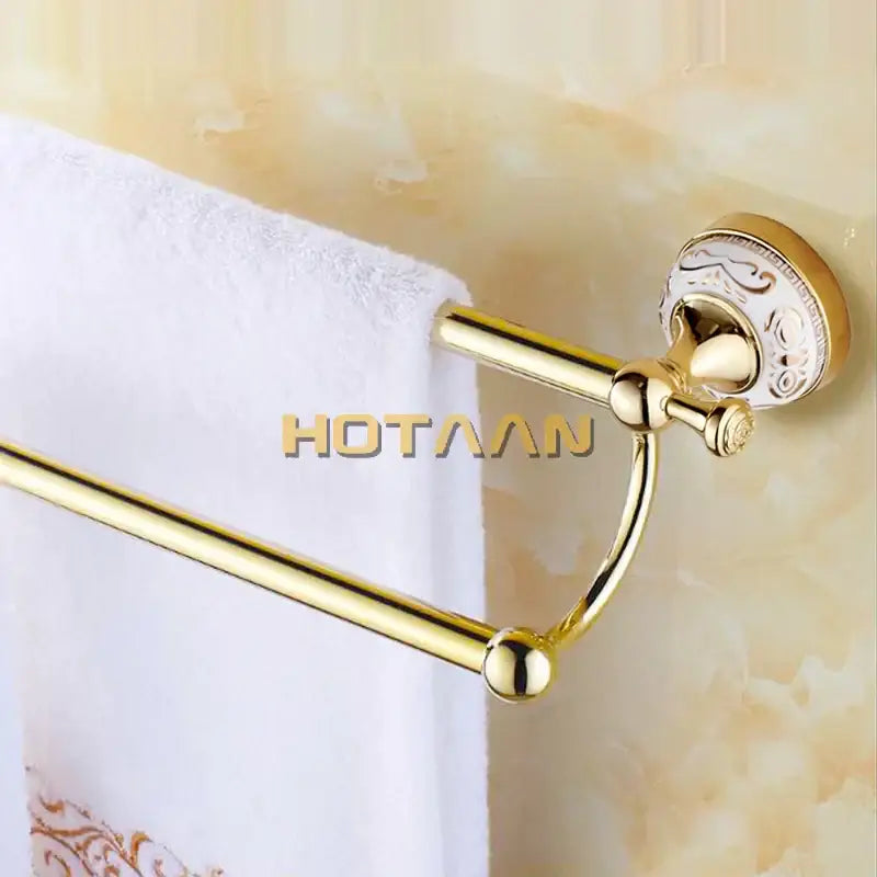 DecorBites 60cm double towel bar with ceramic gold finish and ornate engraved circular wall mounts for bathroom use