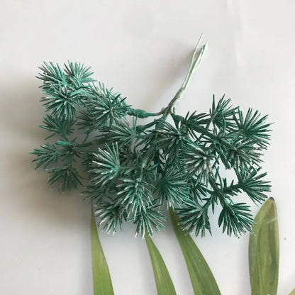 Artificial green pine branch with spiky textured needles and thin wire stem in DecorBites™ 6pcs dried flower mix for crafts