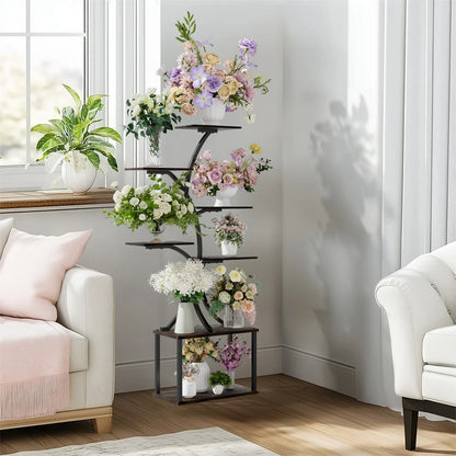 Decorbites™ black metal plant stand display rack with five curved shelves holding floral arrangements in clear vases