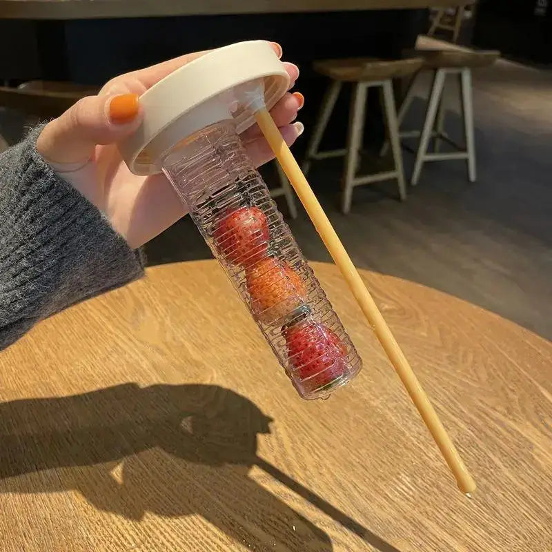 Clear plastic decorbites 700ml filtered water bottle with white lid bamboo straw and strawberries inside ribbed body