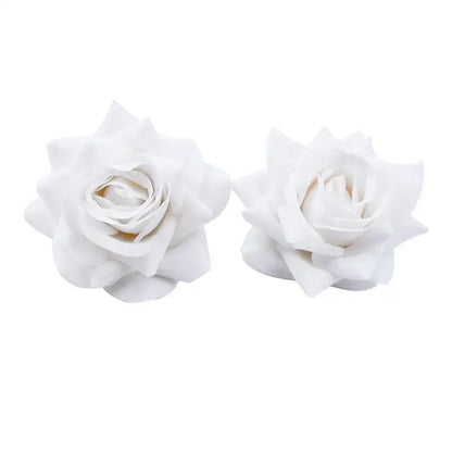 Two identical white foam rose heads with layered petals soft plush texture decorbites 7cm rose for wedding décor