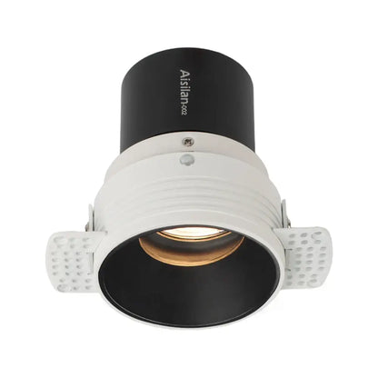 Black and white decorbites 7w cri97 led downlight with textured side flanges and modern recessed ceiling design