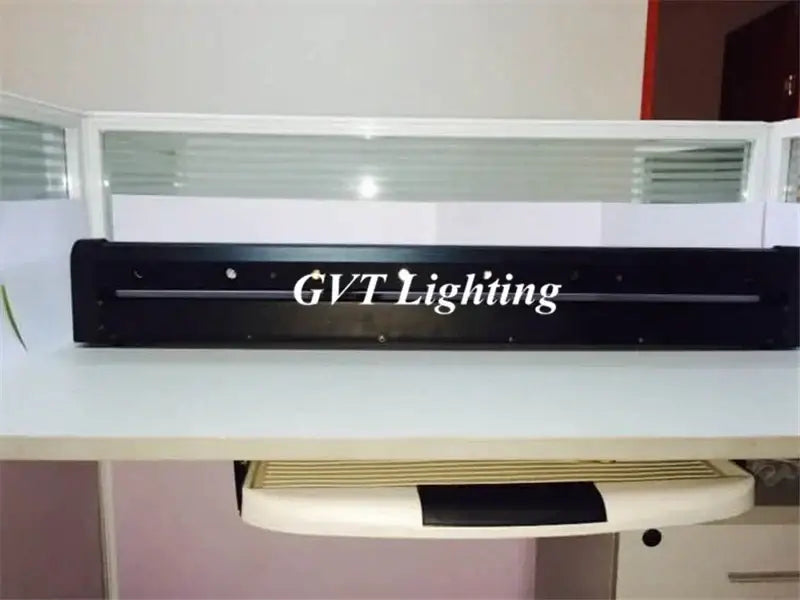 Black rectangular led light bar with gvt lighting logo featuring rgb laser array moving technology for stage lighting use