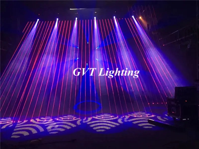 Purple and red rgb laser array moving head light beams create dynamic stage lighting patterns on a dark party stage floor