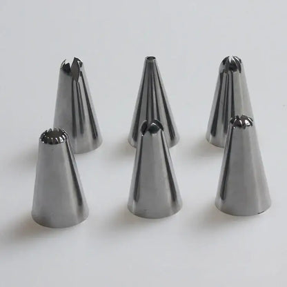 Set of six stainless steel piping tips included in the DecorBites 8pc silicone piping bag and 6pc nozzle set for cake decorating