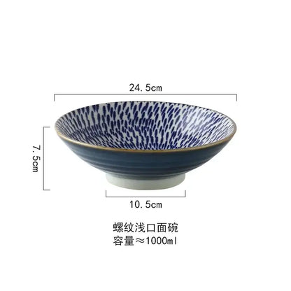 A ceramic japanese ramen bowl with deep blue exterior and dark blue speckled interior for soup salad rice use