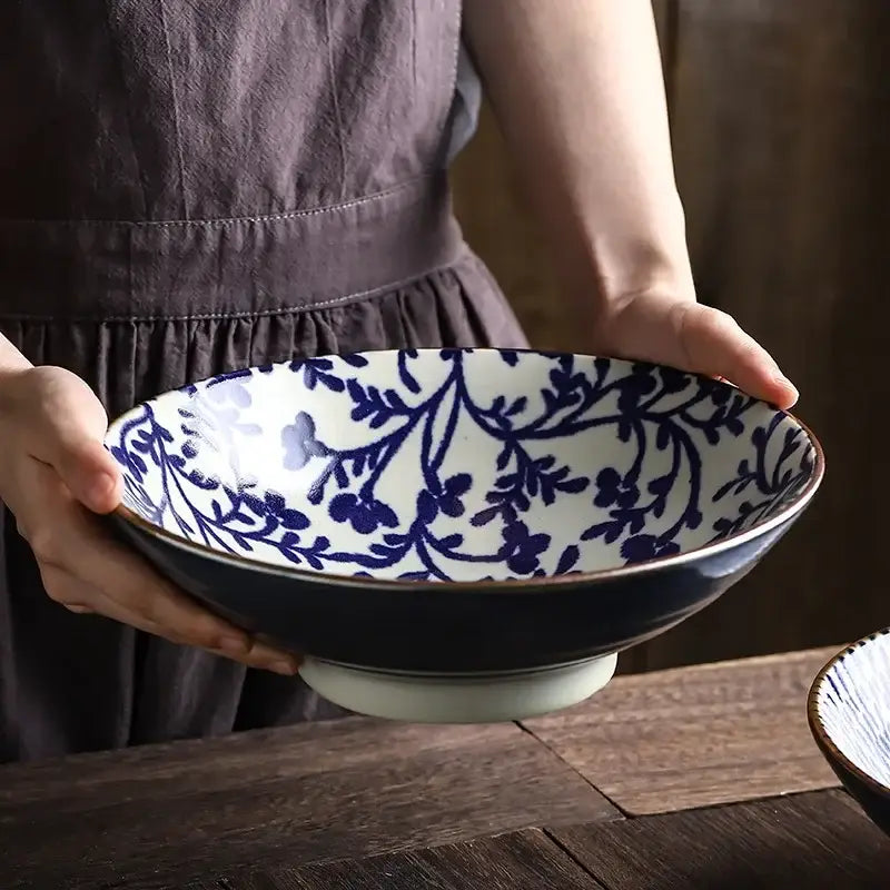 DecorBites™ 9.5 ceramic Japanese ramen bowl with white interior blue floral patterns and dark navy exterior for microwave use