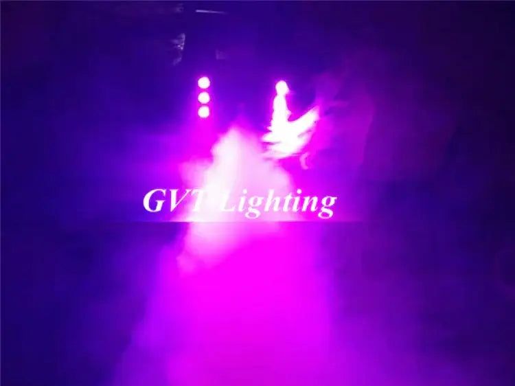 DecorBites 900w led fog machine with purple stage lighting for colorful spray light bar and smoke effects use