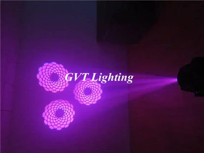 Decorbites 90w led moving head light projecting a purple floral gobo pattern with a 3 face prism for stage events