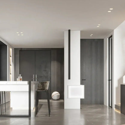 Minimalist white bar stool with black metal legs and woven mesh seat next to DecorBites™ led recessed downlight