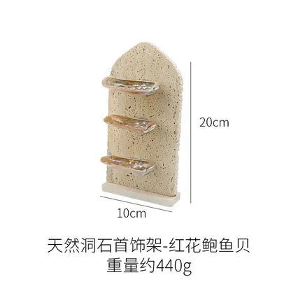 Beige textured stone decorbites abalone shell jewelry organizer with three horizontal iridescent abalone shell tiers