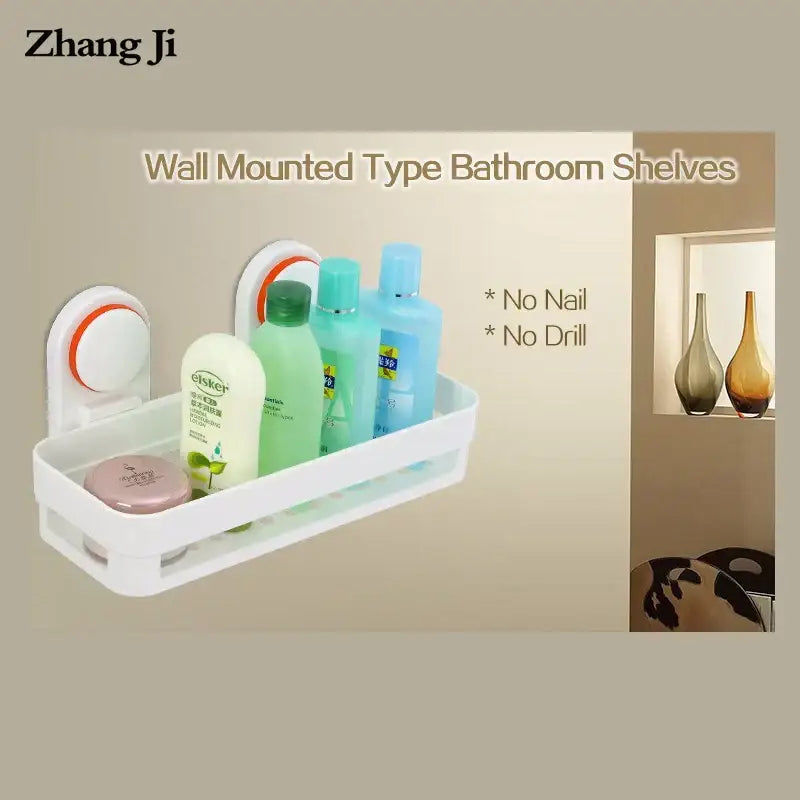 White plastic DecorBites ABS suction cup bathroom shelf with orange suction cups for easy wall-mounted shower storage