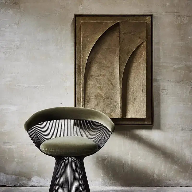 Olive green velvet cushioned chair with black wireframe base paired with decorbites™ abstract 3d geometry canvas prints