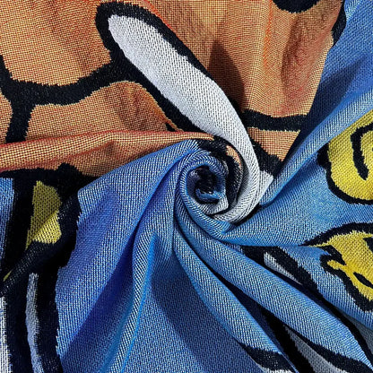 Blue and orange patterned scarf with cartoon design featured in decorbites abstract aesthetic tapestry sofa blanket