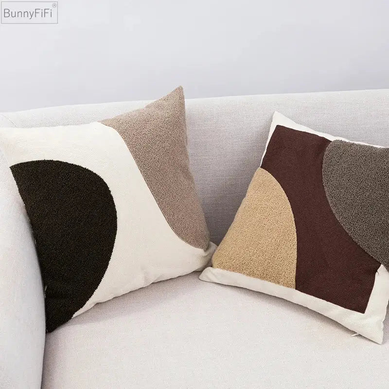 Two bunnyfifi throw pillows with decorbites abstract beige coffee brown cushion cover in textured neutral tones