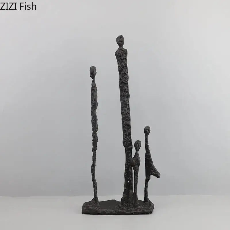Dark gray textured decorbites abstract cast iron figure sculpture of four stylized human figures on a shared base