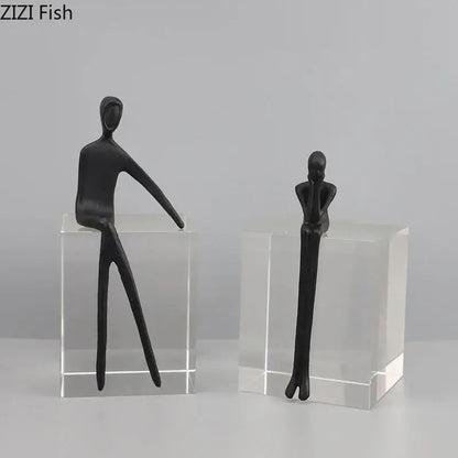 Black decorbites abstract character sculpture with minimalist forms on crystal base for modern room decor