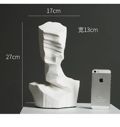 White abstract characters sculpture with textured layered surfaces decorbites abstract characters for modern decor