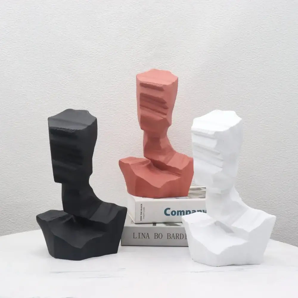 Decorbites abstract characters sculpture featuring three minimalist busts in black terracotta and white for modern decor