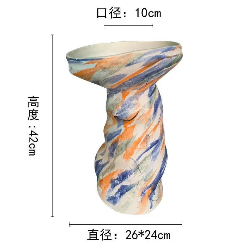 Decorbites abstract clay pot with irregular shape and swirling orange blue and white paint colorful ceramic vase