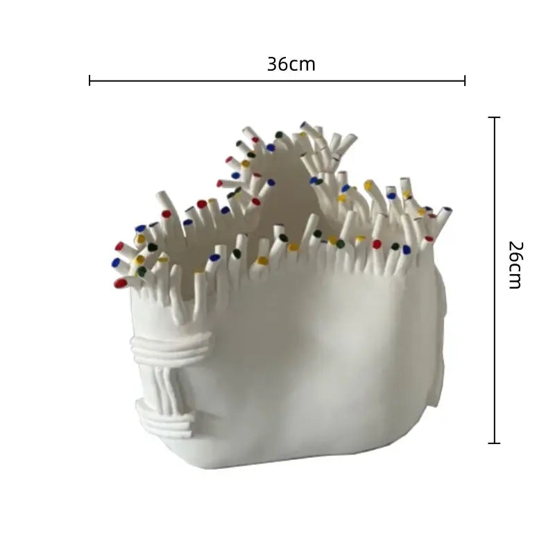 White ceramic decorbites abstract coral matchstick holder with colorful tipped matches and textured coral shapes flower surface