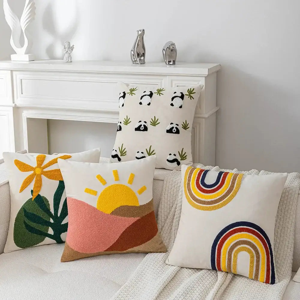 Cozy cream-colored decorbites abstract embroidery cushion cover with vibrant hand-tufted rainbow on soft velvet
