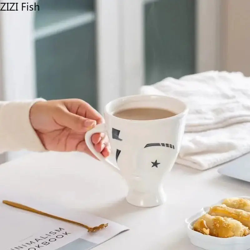 White ceramic mug with black decorbites abstract face ceramic star design for coffee tea and juice use