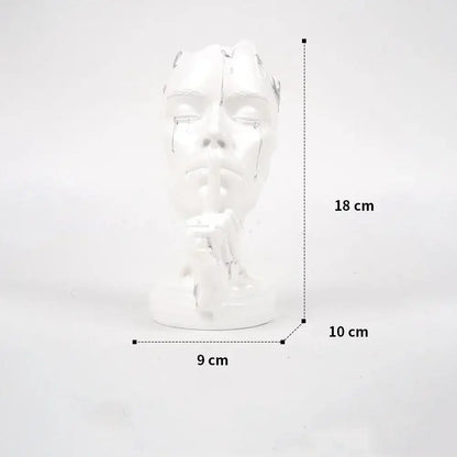 Glossy white ceramic decorbites abstract face mask silence gold resin statue with tear streaks and finger on lips for home decor