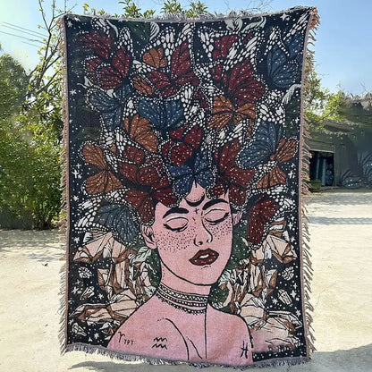 Woven decorbites abstract face throw blanket featuring a colorful butterfly crown on a dark background 130x180cm