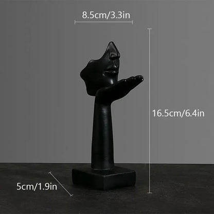 Decorbites abstract figurines black glossy resin sculpture of stylized face with open mouth and outstretched hand on base
