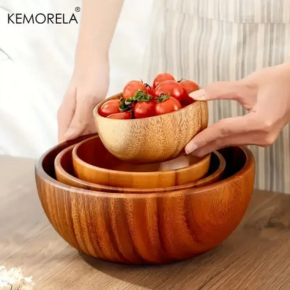 Set of three nested decorbites acacia wooden salad bowls with warm finish and visible grain patterns for versatile use