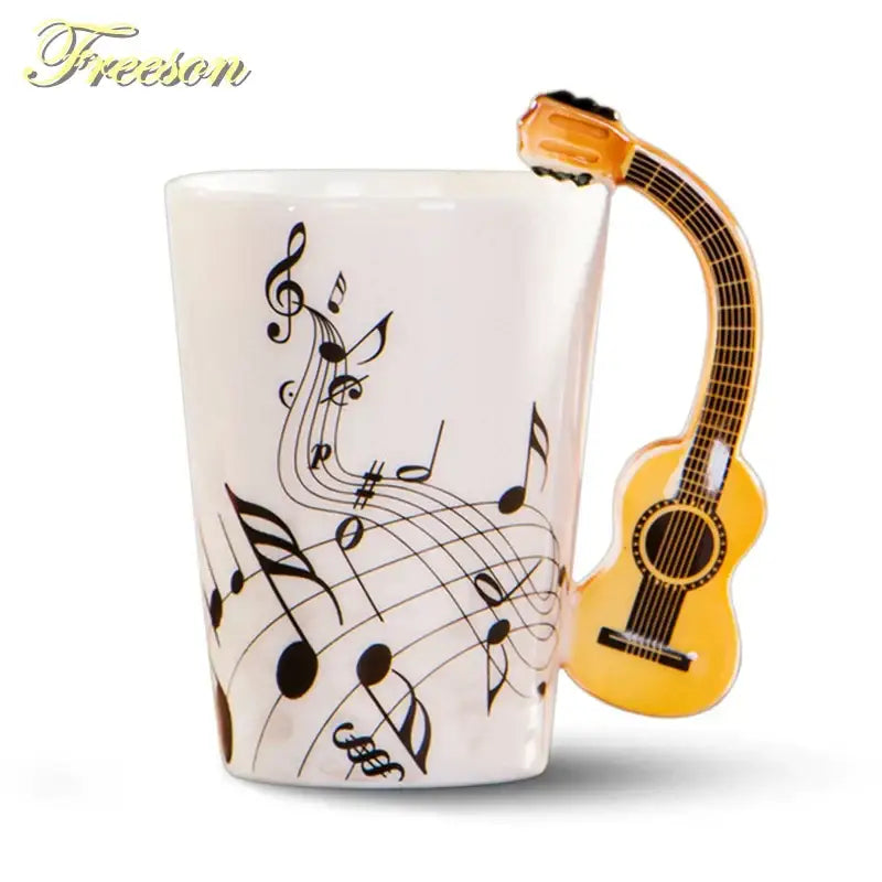 White ceramic acoustic guitar mug with 3d yellow guitar handle and black musical notes decoration for coffee or tea