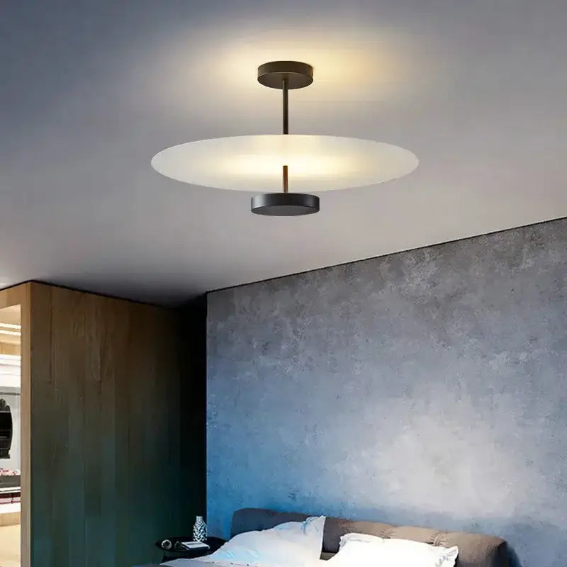 Modern minimalist acrylic black round chandelier with frosted glass disc and matte black metal frame for bedroom lighting