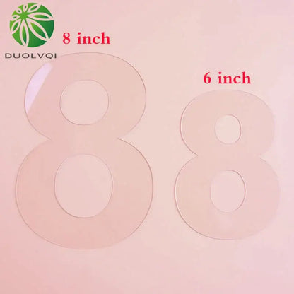 Clear acrylic number cutouts in 8-inch and 6-inch sizes from the DecorBites™ acrylic cake decorating stencil set for cake decorating
