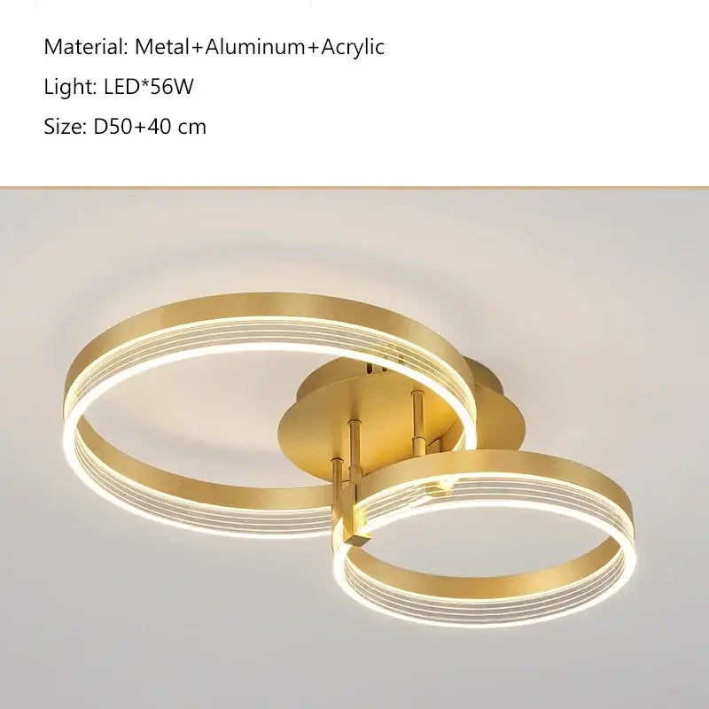 Modern gold-toned acrylic ceiling chandelier with two interlocking led rings for living room and kitchen decoration