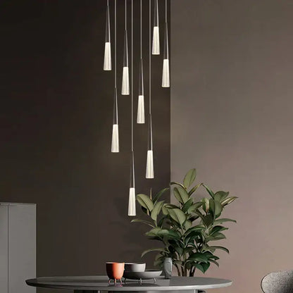 Modern minimalist acrylic cone pendant light with frosted glass shades and slender metallic rods for villa stair or kitchen