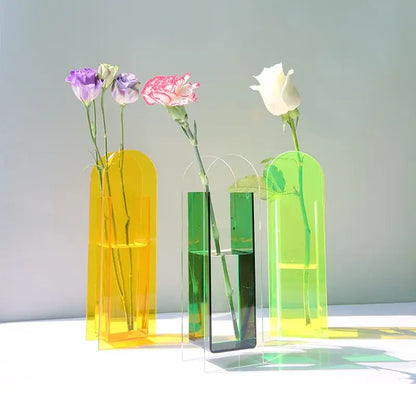 DecorBites acrylic flower vase set with three translucent yellow, green, and lime green acrylic flower containers