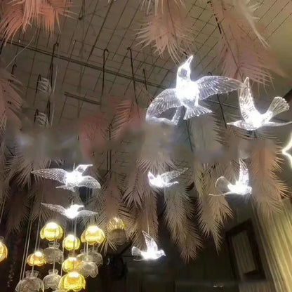 Illuminated acrylic flying birds led lamp with soft white light hanging for wedding party stage décor by decorbites