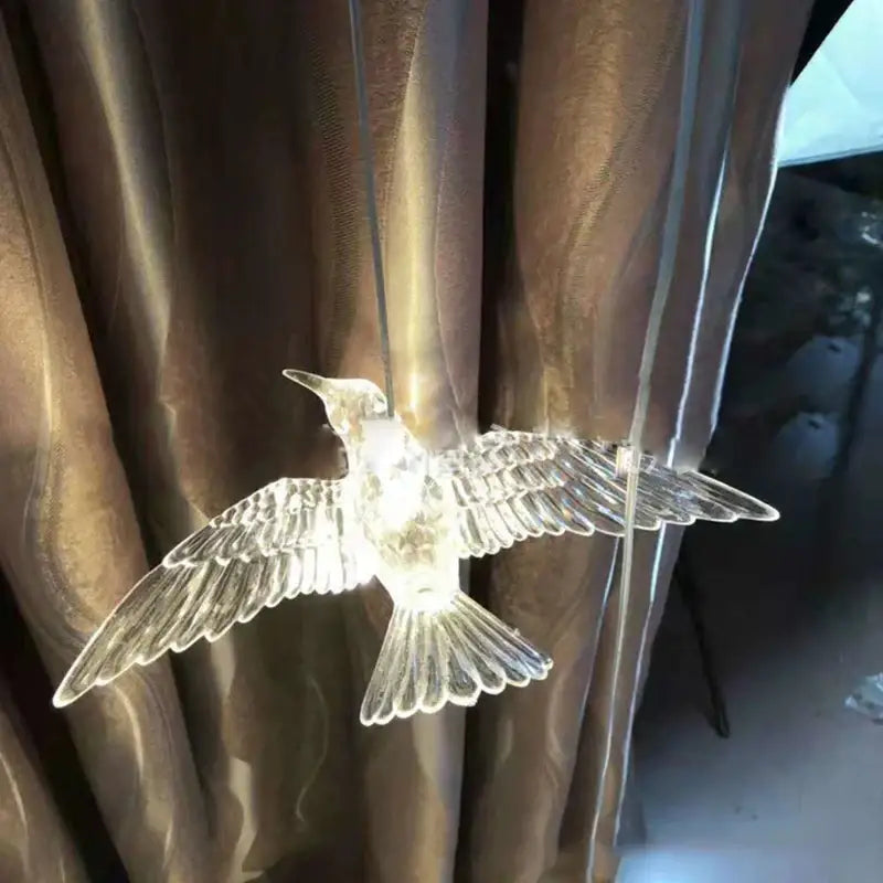 Decorbites™ acrylic flying birds led lamp features a translucent illuminated bird with detailed wings for wedding décor
