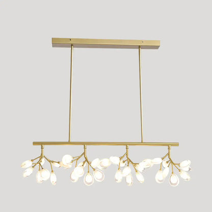 Gold-toned decorbites acrylic island lighting fixture with 36 bulbs and teardrop glass pendants for dining rooms