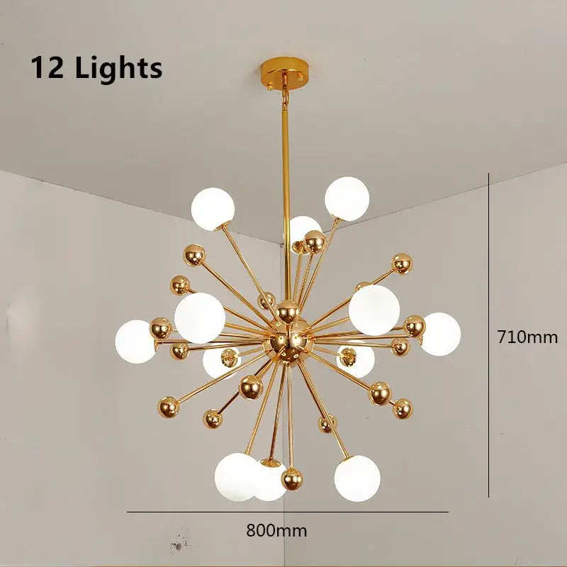 Gold finished decorbites acrylic molecule chandelier with twelve frosted glass globes in a starburst design for dining room