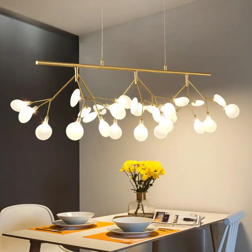 Gold-toned firefly metal pendant chandelier with branching arms and frosted globe bulbs features adjustable hanging cord for bedroom lighting