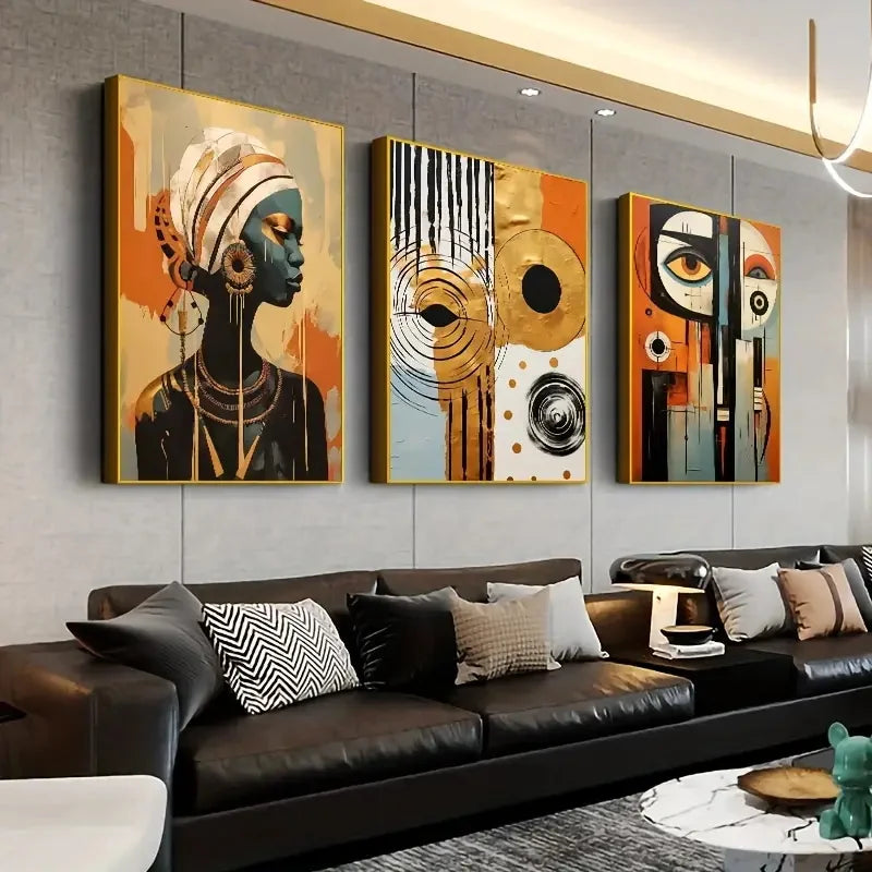 Decorbites™ african abstract art set features three framed bold orange gold black and white wall art pieces above sofa